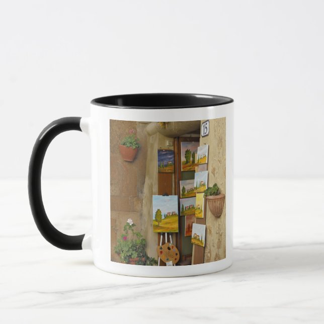 Caneca Pequena loja com trabalho de arte para venda na ca (Esquerda)