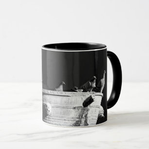 Caneca Pombos numa caneca-de-café