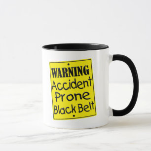 Caneca propensa a los accidentes de advertência d