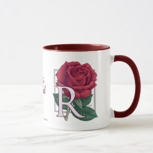 Caneca R para o monograma cor-de-rosa da flor