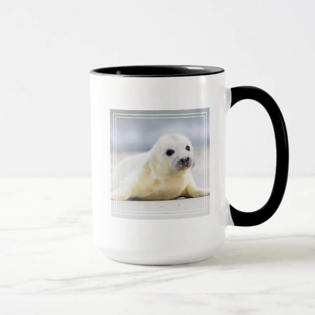 Caneca Selo de bebê das imagens | de Getty (Direita)