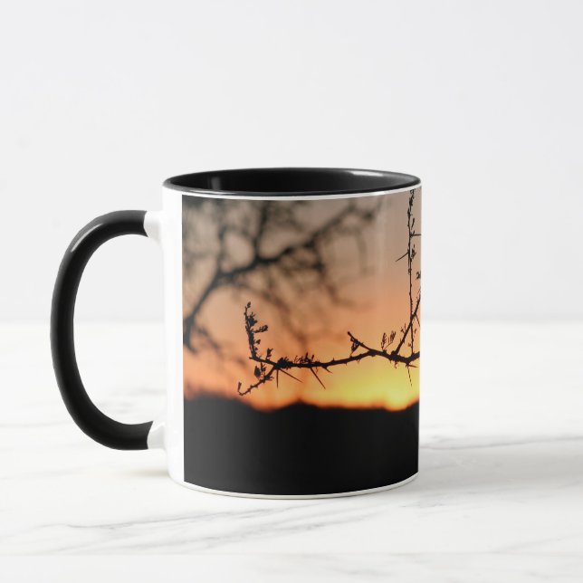 Caneca Sol africano com silhueta espinhal de acácia (Esquerda)