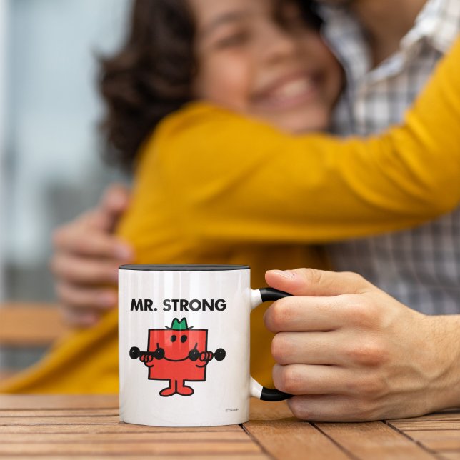 Caneca Sr. Strong | Peso de elevação (Person holding mug)