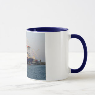 Caneca Tosquiadeira do comodoro no porto de St Peter,