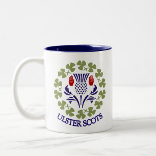 Caneca Ulster-Escocesa do cardo & do trevo