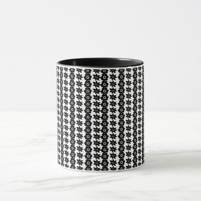 Caneca um fundo preto e branco com muitos pontos (Centro)