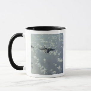 Caneca Uma formação do três-navio dos raptores F-22