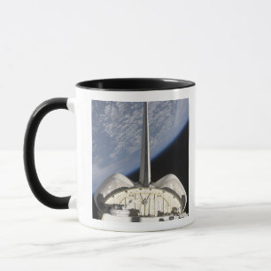 Caneca Uma ideia parcial do esforço do vaivém espacial