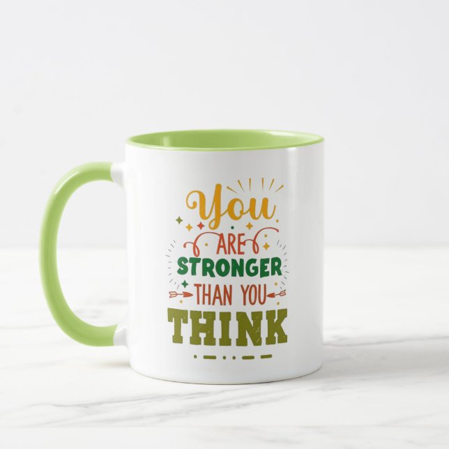 Caneca Você É Mais Forte Do Que Acha | cafetão verde (Esquerda)