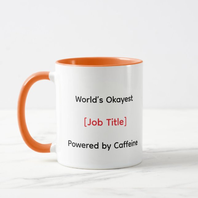 Caneca "World's Okayest [Cargo] - Powered by Caffeine (Esquerda)