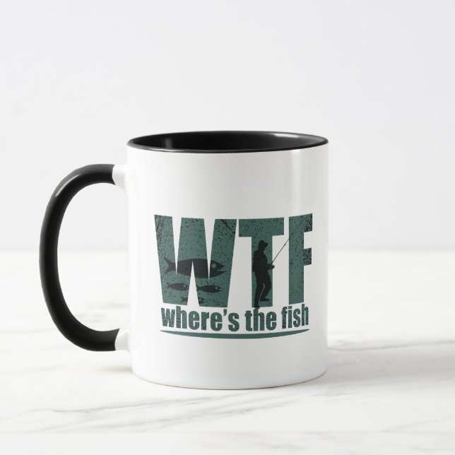Caneca WTF onde está a pesca engraçada do peixe (Esquerda)