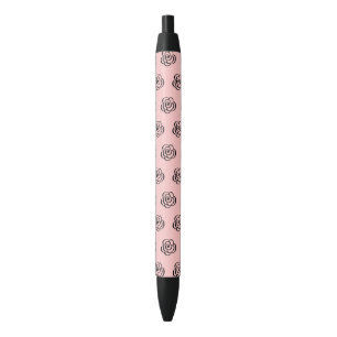 Caneta cor-de-rosa e preta do teste padrão de flo