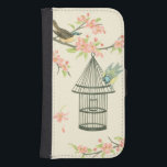 Capa Carteira Para Samsung Galaxy S4 Aves Pequenas Empoleiradas em uma ramificação e em<br><div class="desc">Nancy Slocum pintou muitas aves ao longo dos anos. Essa imagem retrata dois pequenos pássaros azuis e amarelos perdidos em um galho cercado por flores cor-de-rosa e que parecem curiosos sobre uma gaiola. Consiga esta legal peça de arte sobre pássaros no seu produto Zazzle hoje.</div>