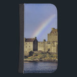 Capa Carteira Para Samsung Galaxy S4 Escócia, Highland, Wester Ross, Eilean Donan<br><div class="desc">Escócia,  Highland,  Wester Ross,  Castelo de Eilean Donan Um arco-íris saúda visitantes no Castelo de Eilean Donan,  em Loch Doich,  na Highland da Escócia � Ric Ergenbright / DanitaDelimont.com</div>