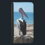 Capa Carteira Para Samsung Galaxy S5 Pelican Perch Em Um Rock Praia,<br><div class="desc">Apresentado em uma rocha de praia perto do oceano é um pelicano faminto e bonito esperando por mariscos-pesadelos.</div>