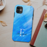 Capa Para iPhone 11 Nome Monograma Azul<br><div class="desc">Esta capas de iphone de na moda é decorada com um design de lavagem a aquarela em tons de azul. Facilmente personalizável com seu nome e monograma. Use a opção Personalizar Mais para alterar o tamanho,  o estilo ou a cor do texto,  se desejar.</div>