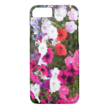 Flores roxas e brancas de petúnia rosa-vermelha