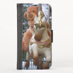 Carrossel com Urso de Teddy<br><div class="desc">Foto de Zolotareva. Teddy Bear foi cavalgar.</div>
