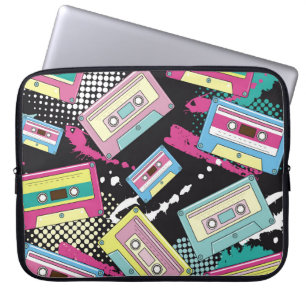 Capa Para Notebook Cassetes de várias cores sobre uma costura preta