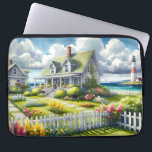 Capa Para Notebook Cottage With View Of The Lighthouse<br><div class="desc">A dreamy coastal cottagecore landscape filled with soft watercolor charm and breezy seaside tranquility. A welcoming seaside cottage sits among lush garden paths, blooming flowers, and a bright white picket fence, creating a warm storybook atmosphere. In the distance, a tall lighthouse rises beside sparkling blue ocean waves, adding a classic...</div>