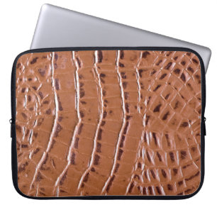 Capa Para Notebook Crocodilo em couro texturizado em fundo abstrato,