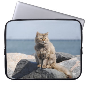 Capa Para Notebook Gato soprando ao vento pela foto do mar
