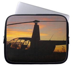 Capa Para Notebook helicóptero Robinson R44 ao pôr do sol