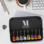 Capa Para Notebook Monograma Colorido de Violão<br><div class="desc">Ilustrações coloridas com guitarra elétrica, acústica e semissítica funky Psicodélica coloridas, completas com monograma personalizado e modelo de nome. Qualquer guitarrista ou músico lhe dirá que você nunca pode ter muitas guitarras. Esta divertida design de guitarra comemora a energia e a variedade deste maravilhoso instrumento musical. O presente perfeito para...</div>