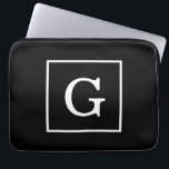 Capa Para Notebook Monograma inicial com quadro branco preto<br><div class="desc">Monograma inicial com quadro branco preto Um fundo sólido na moda preto com uma área de enquadramento branco para o seu monograma, nome ou outro texto. Você também pode alterar a fonte do texto, alterar o tamanho e a cor da fonte, mover o texto etc. Se você quiser esta design...</div>