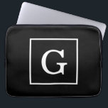 Capa Para Notebook Monograma inicial com quadro branco preto<br><div class="desc">Monograma inicial com quadro branco preto Um fundo sólido na moda preto com uma área de enquadramento branco para o seu monograma, nome ou outro texto. Você também pode alterar a fonte do texto, alterar o tamanho e a cor da fonte, mover o texto etc. Se você quiser esta design...</div>