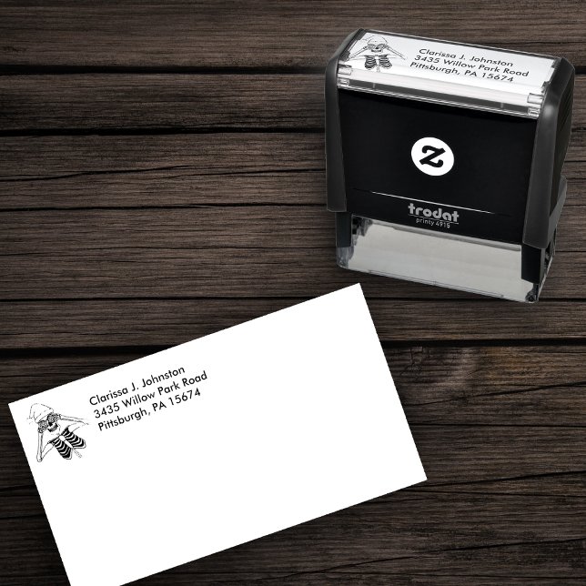 Carimbo Auto Entintado Bobo Skeleton Enfeites de natal Olhos Santa Hat (Line drawing of christmas fun skeleton  wearing Santa hat on self inking return address stamp.)