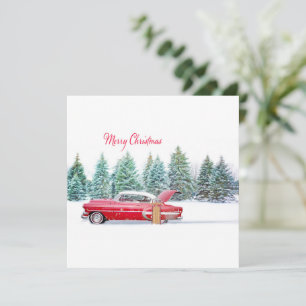 Carro vermelho vintage de Natal com paisagem nevad