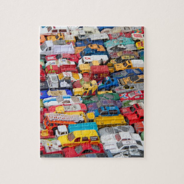 Carros de brinquedo e Quebra-cabeça de caminhões c (Vertical)
