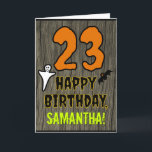 Cartão 23.o aniversário: Tema do Dia das Bruxas, Nome Per<br><div class="desc">A frente deste design de cartão de saudação temido e assustador de aniversário do Hallowe'en apresenta um grande número "23", junto com a mensagem "FELIZ ANIVERSÁRIO", e um nome personalizado. Há também representações de um morcego e de um fantasma na frente. O dentro apresenta uma mensagem de saudação de aniversário...</div>
