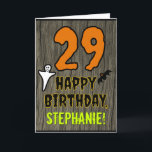 Cartão 29.o aniversário: Tema do Dia das Bruxas, Nome Per<br><div class="desc">A frente deste design de cartão de saudação temático assustador e assustador Hallowe'en apresenta um grande número "29". Também apresenta a mensagem "FELIZ ANIVERSÁRIO" e um nome editável. Há também representações de um fantasma e um morcego na frente. O dentro apresenta uma mensagem de saudação de aniversário personalizada, ou talvez...</div>