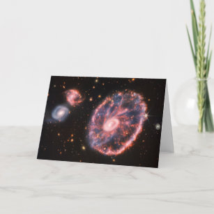 Cartão A Galáxia De Rodas De Cartaz E Suas Galáxias Compa