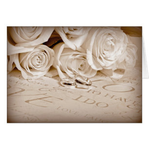 Cartão Alianças de casamento e rosas