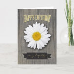 Cartão Aniversário da esposa, madeira rústica e design da<br><div class="desc">Este cartão de aniversário para a esposa caracteriza uma sensação rústica com fundo da grão e a silhueta de madeira resistidos da foto da margarida com design de madeira do ornamento. Tipografia afligida, ocidental do estilo e bandeira com a pia batismal bonita do roteiro em amarelo pálido. créditos: allsilhouettes.com para...</div>