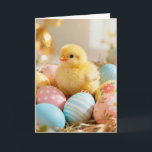 Cartão Baby Chick and Easter Eggs<br><div class="desc">A fluffy yellow chick nestles among decorated eggs on this darling Easter card.  Very cute!</div>