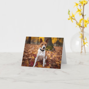 Cartão Basenji no outono deixa cair inspiração