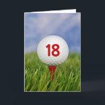 Cartão Bola de Golfe de 18º aniversário no Tee Vermelho<br><div class="desc">Bola de golfe branca na teta vermelha na grama,  no 18.º aniversário. O número de idade na bola de golfe pode ser mudado.</div>