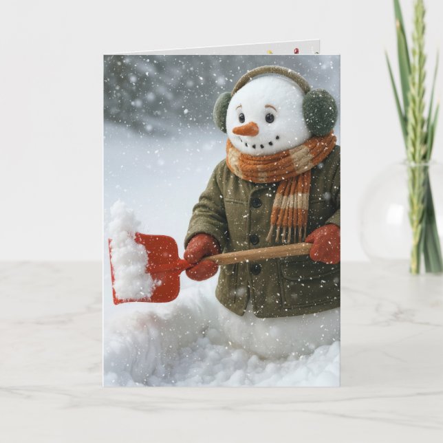 Cartão Boneco de Neve de Natal Removendo Neve (Frente)