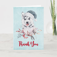 Cachorro Husky de Natal em um Chapéu de Papai Noel