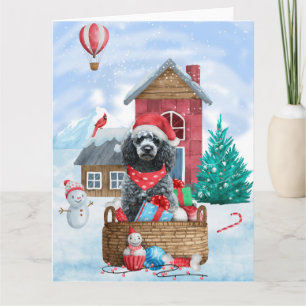 Cartão Cachorro Poodle na Casa de Natal na neve