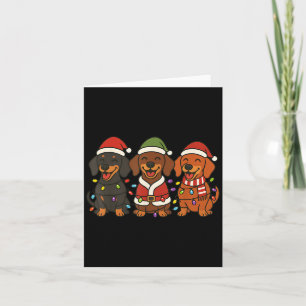 Cartão Cachorros Dachshund Fofos Luzes de Natal Papai Noe