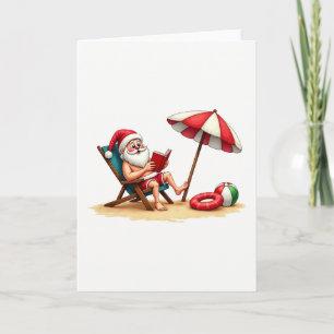 Cartão Cadeira de Praia do Papai Noel Lendo Natal Tropica