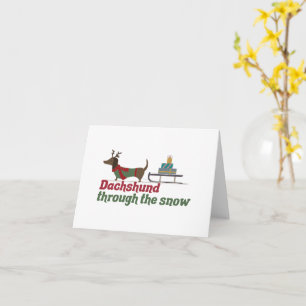 Cartão Canhoto de Natal: Dachshund Através da Neve