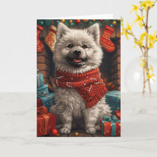 Cartão Cão Keeshond com Presentes de Natal Lareira