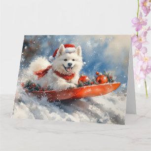 Cartão Cão Samoyed em Trenó Deixe Nevar Natal