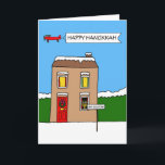 Cartão Casa de autoisolamento de Hanukkah, Feliz 19<br><div class="desc">Uma caricatura coberta de neve com um cartaz isolante fora dela e um avião sobrevoando. O avião tem um cartaz voando atrás dele que diz "Feliz Chanucá".</div>
